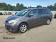 2015 Toyota Sienna LE with VIN 5TDKK3DC8FS601042, listed as a Copart auction lot 70295345 with 134,973 mi miles and Clean title. Bid and sale history available at DreamBid. Image 1.