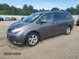 2015 Toyota Sienna LE with VIN 5TDKK3DC8FS601042, listed as a Copart auction lot 70295345 with 134,973 mi miles and Clean title. Bid and sale history available at DreamBid. Image 1.