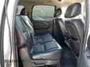 2011 Chevrolet Suburban with VIN 1GNWK5EG0BR121950, listed as a Copart auction lot 82678394 with 154,952 mi miles and Salvage title. Bid and sale history available at DreamBid. Image 11.