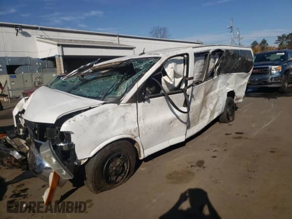 2013 Chevrolet Express Passenger LT с VIN 1GAZG1FGXD1164040, выставлен на аукционе Copart как лот 77002594 с пробегом Не указан миль и Списание • Salvage title. История ставок и продаж доступна на DreamBid. Изображение 1.