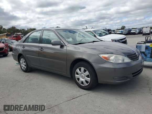 2004 Toyota Camry LE с VIN 4T1BE32K44U928043, выставлен на аукционе Copart как лот 85714775 с пробегом 137 376 миль миль и Списание • Salvage title. История ставок и продаж доступна на DreamBid. Изображение 4.