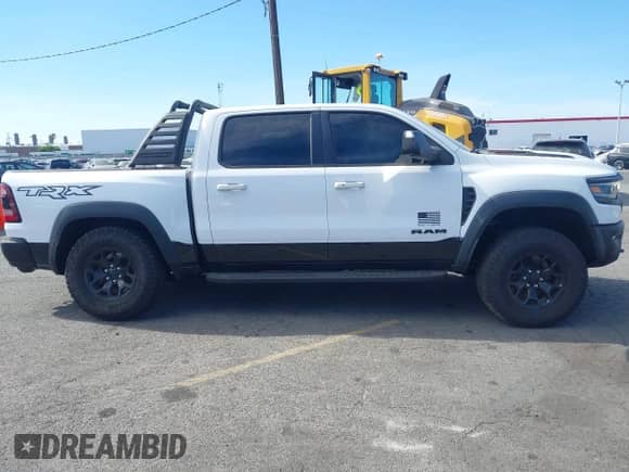 2021 Ram 1500 TRX with VIN 1C6SRFU9XMN905260, listed as a IAAI auction lot 41745910 with 69,565 mi miles and . Bid and sale history available at DreamBid. Image 13.