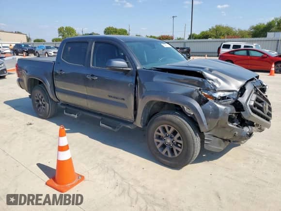 2021 Toyota Tacoma SR5 with VIN 3TMAZ5CN2MM159913, listed as a Copart auction lot 80368735 with 71,895 mi miles and Salvage title. Bid and sale history available at DreamBid. Image 4.