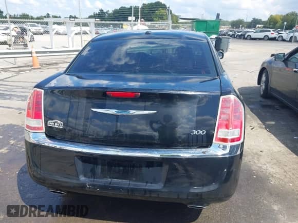 2012 Chrysler 300 Limited z VIN 2C3CCACGXCH285121, wystawiony jako IAAI lot #43195978 z przebiegiem 111 128 mil mil oraz . Historia ofert i sprzedaży dostępna na DreamBid. Obrazek 16.