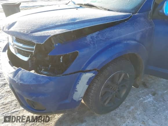 2015 Dodge Journey SXT z VIN 3C4PDCCB8FT718909, wystawiony jako IAAI lot #41419368 z przebiegiem 140 543 mil mil oraz . Historia ofert i sprzedaży dostępna na DreamBid. Obrazek 6.