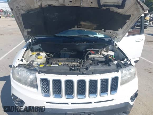 2014 Jeep Compass Latitude with VIN 1C4NJCEB3ED642937, listed as a IAAI auction lot 43228516 with Not provided miles and . Bid and sale history available at DreamBid. Image 10.