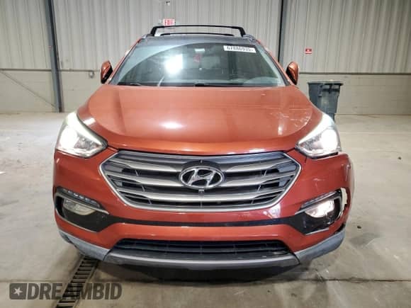 2017 Hyundai Santa Fe 2.4L with VIN 5XYZU3LB2HG414624, listed as a Copart auction lot 67886935 with 66,730 mi miles and Salvage title. Bid and sale history available at DreamBid. Image 5.