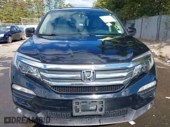 2017 Honda Pilot EX-L with VIN 5FNYF6H70HB006075, listed as a IAAI auction lot 43388253 with 172,698 mi miles and . Bid and sale history available at DreamBid. Image 13.