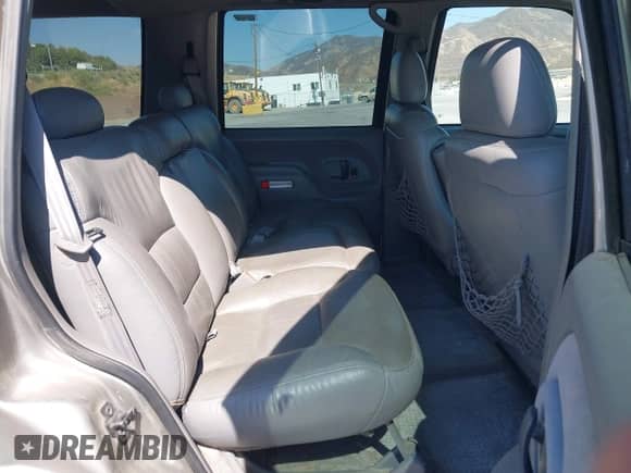 1999 Chevrolet Tahoe Z71 with VIN 1GNEK13R0XJ528438, listed as a IAAI auction lot 42761532 with 235,135 mi miles and . Bid and sale history available at DreamBid. Image 8.