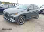 2023 Hyundai Tucson SEL with VIN 5NMJFCAE1PH262358, listed as a IAAI auction lot 43276432 with 26,150 mi miles and . Bid and sale history available at DreamBid. Image 2.