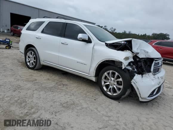 2017 Dodge Durango Citadel with VIN 1C4RDHEG3HC854782, listed as a Copart auction lot 81464774 with 135,638 mi miles and Salvage title. Bid and sale history available at DreamBid. Image 4.