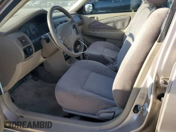 2000 Chevrolet Prizm with VIN 1Y1SK5485YZ407556, listed as a Copart auction lot 60894355 with 123,708 mi miles and Salvage title. Bid and sale history available at DreamBid. Image 7.