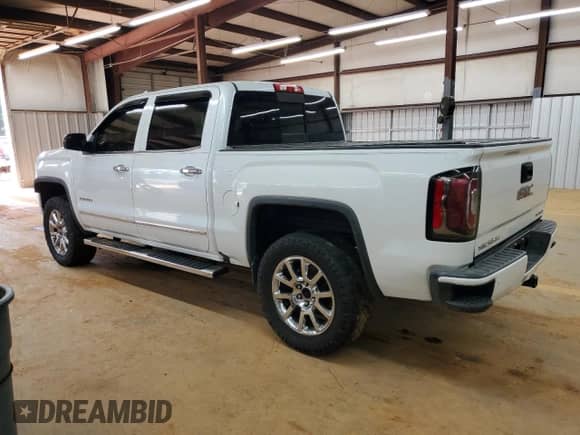 2016 GMC Sierra 1500 Denali z VIN 3GTU2PEJ1GG221537, wystawiony jako Copart lot #80850875 z przebiegiem Nie podano mil oraz Szkoda całkowita • Salvage title. Historia ofert i sprzedaży dostępna na DreamBid. Obrazek 2.