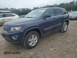2014 Jeep Grand Cherokee Laredo z VIN 1C4RJFAG1EC239355, wystawiony jako Copart lot #80995415 z przebiegiem 209 285 mil mil oraz Szkoda całkowita • Salvage title. Historia ofert i sprzedaży dostępna na DreamBid. Obrazek 1.