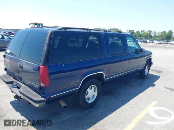 1997 Chevrolet Suburban z VIN 3GNEC16R8VG111155, wystawiony jako IAAI lot #42634153 z przebiegiem 282 812 mil mil oraz . Historia ofert i sprzedaży dostępna na DreamBid. Obrazek 4.