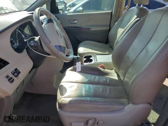 2013 Toyota Sienna XLE AAS with VIN 5TDYK3DC2DS356679, listed as a Copart auction lot 85183895 with 148,252 mi miles and Salvage title. Bid and sale history available at DreamBid. Image 7.