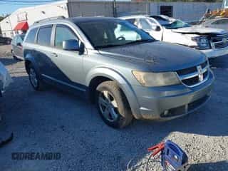 2010 Dodge Journey SXT with VIN 3D4PG5FVXAT148013, listed as a IAAI auction lot 43487466 with 109,732 mi miles and . Bid and sale history available at DreamBid. Image 1.
