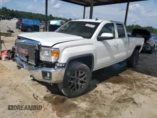 2014 GMC Sierra 1500 SLE with VIN 1GTR1UEC7EZ232676, listed as a Copart auction lot 64230215 with 142,117 mi miles and Salvage title. Bid and sale history available at DreamBid. Image 1.