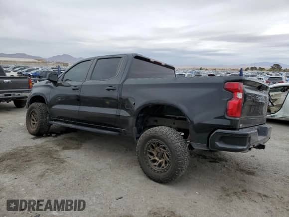 2023 Chevrolet Silverado 1500 Custom Trail Boss with VIN 3GCUDCEDXPG172089, listed as a Copart auction lot 48074715 with 32,880 mi miles and Salvage title. Bid and sale history available at DreamBid. Image 2.