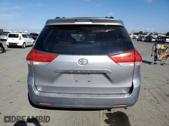 2013 Toyota Sienna LE AAS with VIN 5TDKK3DC7DS349751, listed as a Copart auction lot 80394155 with 145,235 mi miles and Salvage title. Bid and sale history available at DreamBid. Image 6.