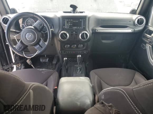 2014 Jeep Wrangler Rubicon with VIN 1C4HJWCG2EL150578, listed as a Copart auction lot 69991225 with 91,221 mi miles and Salvage title. Bid and sale history available at DreamBid. Image 8.