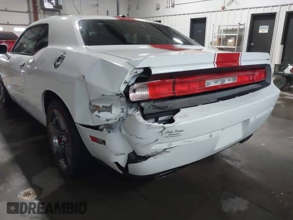 2013 Dodge Challenger SXT with VIN 2C3CDYAG8DH554016, listed as a IAAI auction lot 41275678 with 55,826 mi miles and . Bid and sale history available at DreamBid. Image 17.