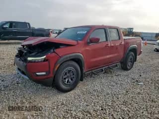 2025 Nissan Frontier Pro-X with VIN 1N6ED1EJXSN637854, listed as a Copart auction lot 65409335 with 2,410 mi miles and Salvage title. Bid and sale history available at DreamBid. Image 1.