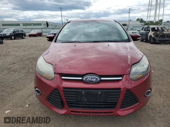 2014 Ford Focus Titanium with VIN 1FADP3J26EL227901, listed as a Copart auction lot 70023645 with 68,796 mi miles and Salvage title. Bid and sale history available at DreamBid. Image 5.