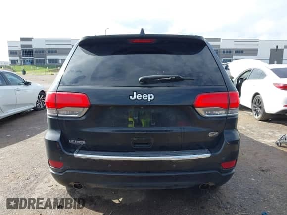 2015 Jeep Grand Cherokee Overland with VIN 1C4RJECG3FC841263, listed as a IAAI auction lot 43293918 with 158,583 mi miles and . Bid and sale history available at DreamBid. Image 16.