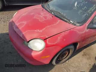 2000 Dodge Neon Highline z VIN 1B3ES46C1YD783702, wystawiony jako IAAI lot #40712156 z przebiegiem 140 724 mil mil oraz . Historia ofert i sprzedaży dostępna na DreamBid. Obrazek 2.