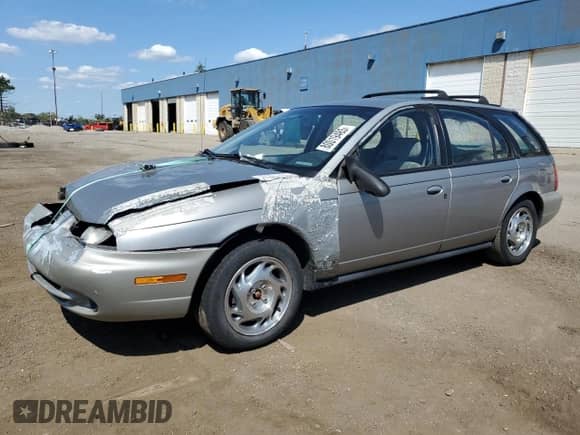 1997 Saturn SW с VIN 1G8ZJ8275VZ270092, выставлен на аукционе Copart как лот 80019485 с пробегом 136 096 миль миль и Чистый • Clean title. История ставок и продаж доступна на DreamBid. Изображение 1.