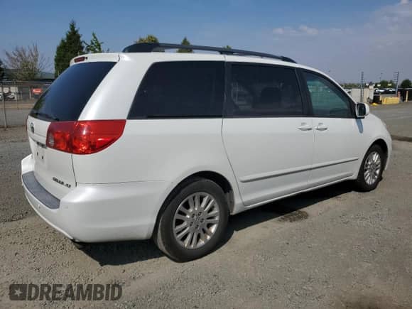 2010 Toyota Sienna XLE с VIN 5TDYK4CC2AS312328, выставлен на аукционе Copart как лот 71203025 с пробегом 182 360 миль миль и Списание • Salvage title. История ставок и продаж доступна на DreamBid. Изображение 3.