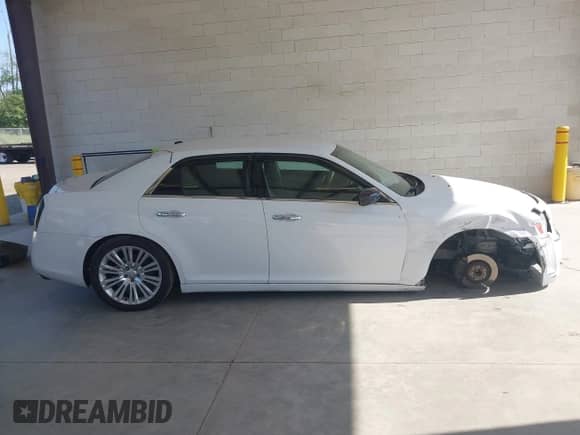 2013 Chrysler 300 C with VIN 2C3CCAET4DH504862, listed as a IAAI auction lot 42403456 with 77,468 mi miles and . Bid and sale history available at DreamBid. Image 14.