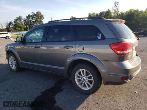 2013 Dodge Journey SXT with VIN 3C4PDCBB5DT521081, listed as a Copart auction lot 71712545 with Not provided miles and Salvage title. Bid and sale history available at DreamBid. Image 2.