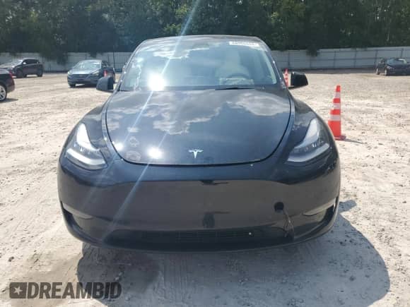 2022 Tesla Model Y Long Range with VIN 7SAYGDEE9NF455340, listed as a Copart auction lot 66966654 with 22,707 mi miles and Salvage title. Bid and sale history available at DreamBid. Image 5.