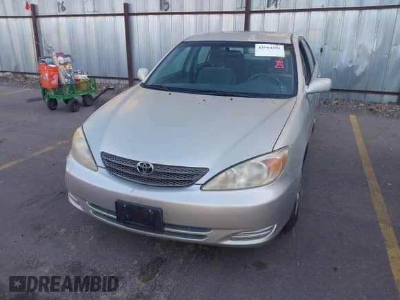 2003 Toyota Camry LE with VIN JTDBE32K130187036, listed as a IAAI auction lot 43504391 with 205,170 mi miles and . Bid and sale history available at DreamBid. Image 6.