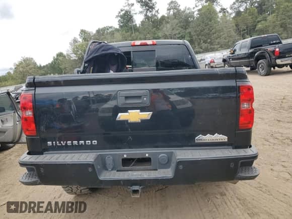 2015 Chevrolet Silverado 1500 High Country with VIN 3GCPCTEC7FG128265, listed as a Copart auction lot 74728294 with Not provided miles and Salvage title. Bid and sale history available at DreamBid. Image 6.