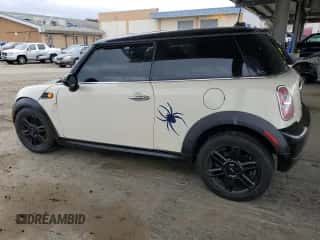 2013 MINI Hardtop with VIN WMWSU3C51DT691076, listed as a Copart auction lot 48066455 with 143,002 mi miles and Salvage title. Bid and sale history available at DreamBid. Image 2.