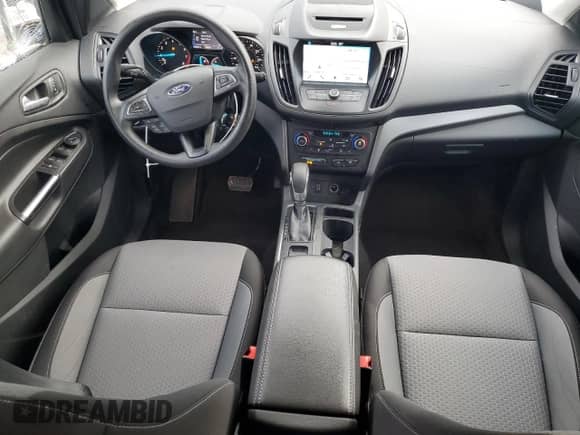 2018 Ford Escape SE z VIN 1FMCU9GD9JUA27475, wystawiony jako Copart lot #82301455 z przebiegiem 66 389 mil mil oraz Szkoda całkowita • Salvage title. Historia ofert i sprzedaży dostępna na DreamBid. Obrazek 8.