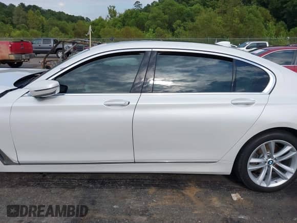 2018 BMW 7 Series 750i with VIN WBA7F0C54JGM23111, listed as a IAAI auction lot 43123859 with Not provided miles and . Bid and sale history available at DreamBid. Image 15.