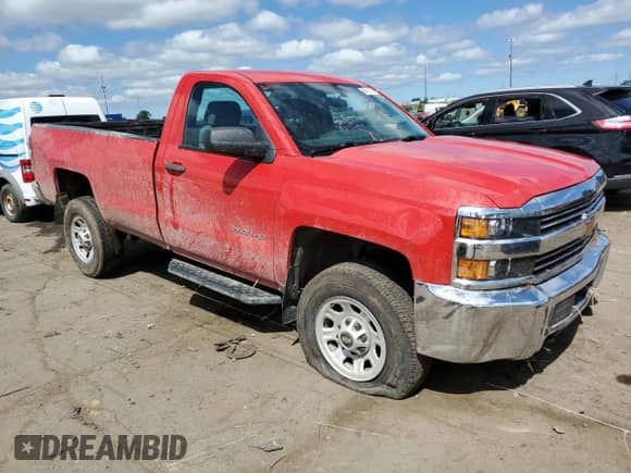 2015 Chevrolet Silverado 2500HD Work Truck with VIN 1GC0KUEG6FZ107937, listed as a Copart auction lot 65411405 with 54,587 mi miles and Salvage title. Bid and sale history available at DreamBid. Image 4.