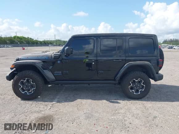 2023 Jeep Wrangler Rubicon with VIN 1C4JJXR60PW568189, listed as a IAAI auction lot 42188577 with 18,615 mi miles and . Bid and sale history available at DreamBid. Image 14.