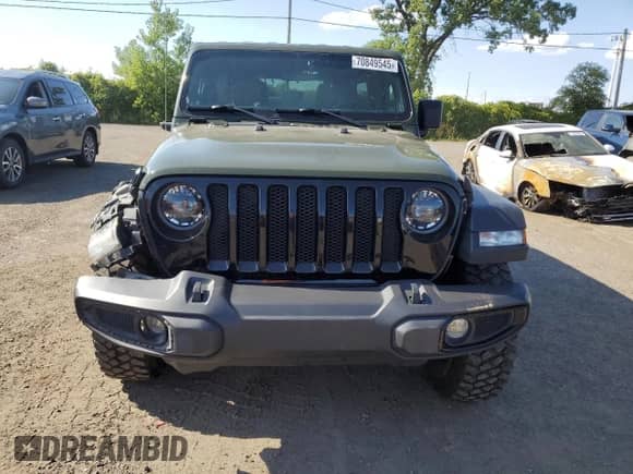 2023 Jeep Wrangler Willys с VIN 1C4HJXDN4PW519963, выставлен на аукционе Copart как лот 70849545 с пробегом 78 396 миль миль и Списание • Salvage title. История ставок и продаж доступна на DreamBid. Изображение 5.