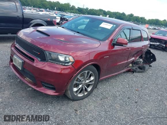 2020 Dodge Durango R/T with VIN 1C4SDJCT1LC412343, listed as a IAAI auction lot 42688369 with 64,153 mi miles and . Bid and sale history available at DreamBid. Image 2.
