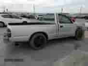 2002 Toyota Tacoma with VIN 5TENL42N82Z080549, listed as a Copart auction lot 80899715 with 115,239 mi miles and Salvage title. Bid and sale history available at DreamBid. Image 3.