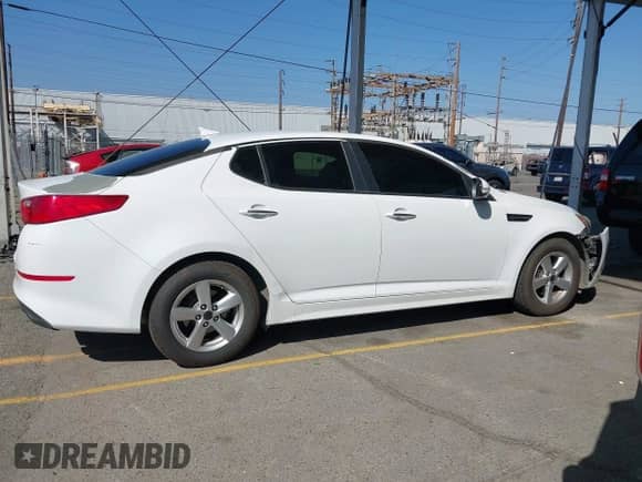 2015 Kia Optima LX with VIN 5XXGM4A72FG441819, listed as a IAAI auction lot 43343929 with 136,901 mi miles and . Bid and sale history available at DreamBid. Image 13.