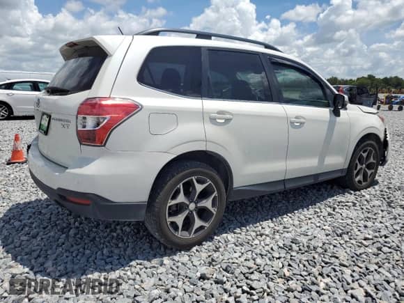 2014 Subaru Forester XT Touring with VIN JF2SJGPCXEH431227, listed as a Copart auction lot 66078405 with 98,060 mi miles and Salvage title. Bid and sale history available at DreamBid. Image 3.