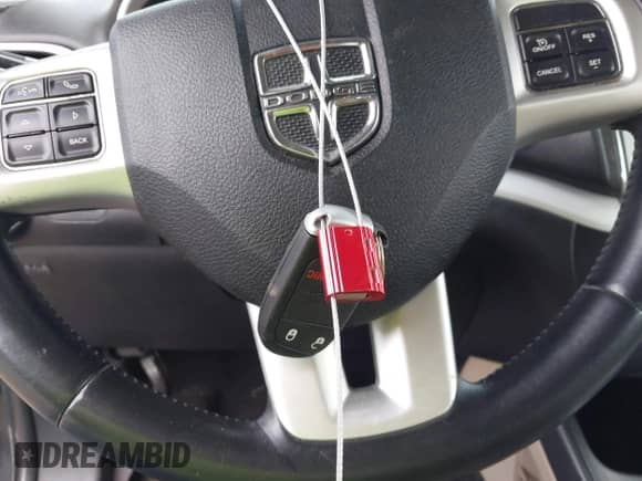 2014 Dodge Journey SE z VIN 3C4PDCAB9ET191688, wystawiony jako IAAI lot #43237865 z przebiegiem 218 594 mil mil oraz . Historia ofert i sprzedaży dostępna na DreamBid. Obrazek 11.