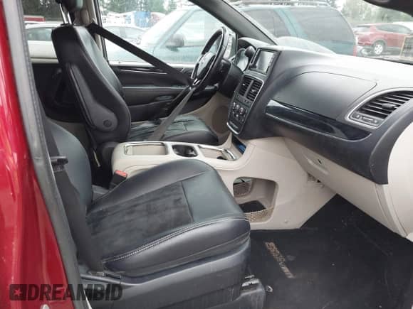 2014 Dodge Grand Caravan SXT with VIN 2C4RDGCG8ER344332, listed as a IAAI auction lot 42941989 with 165,945 mi miles and . Bid and sale history available at DreamBid. Image 5.