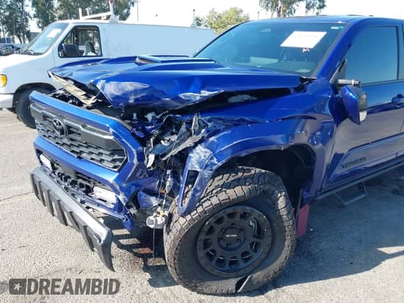 2024 Toyota Tacoma TRD Off Road with VIN 3TMLB5JN8RM074856, listed as a IAAI auction lot 43139396 with 8,137 mi miles and . Bid and sale history available at DreamBid. Image 6.
